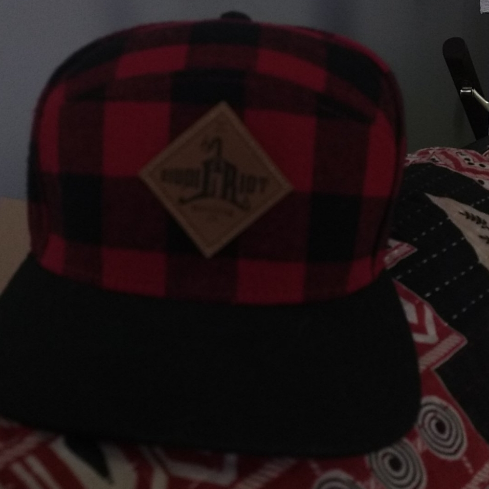 Liquid riot bottling company hat
